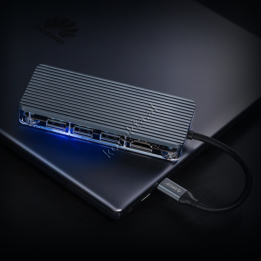 Adaptor Me Shumë Porta 8 Në 1 Orico Për Laptop/Celular Me Portë Type-C